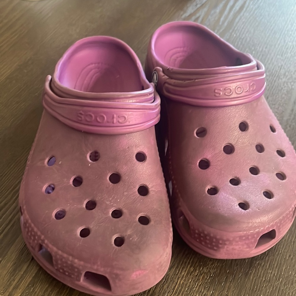 Women size 6 crocks.  Color is a little faded, but they are in good shape.